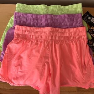 Neon Pink Vibrant Women's Running Shorts with underwear